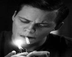 Bill Skarsgard smoking